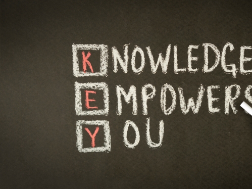 "knowledge empowers you" written in chalk